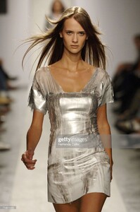 model-walks-down-the-runway-during-the-zoomp-summer-2007-fashion-show-picture-id71431405.thumb.jpg.870a52cf239360502d68390cceee5deb.jpg