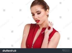 stock-photo-portrait-of-a-cheerful-young-brunette-woman-in-red-dress-posing-and-looking-away-over-white-582299350.jpg