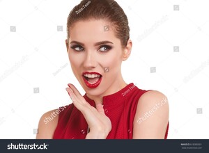 stock-photo-portrait-of-a-cheerful-young-brunette-woman-in-red-dress-posing-and-looking-away-over-white-618385001.jpg