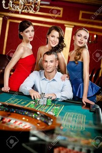 1697075991_17824588-l-homme-entour-de-filles-joue--la-roulette-au-casino.thumb.jpg.5c4f15ea71afb9f0a8a8273261784a0e.jpg