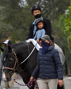 38738628-9210609-Thoughtful_They_both_played_it_smart_by_wearing_black_helmets_as-a-5_1612193193044.jpg