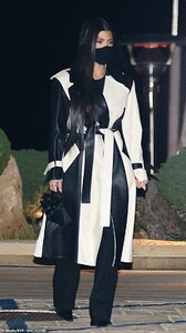 39057440-9239615-Statement_garment_The_Poosh_founder_41_wore_a_chic_and_becoming_-a-4_1612854769120.jpg