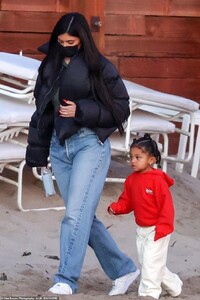 39378332-9268095-Comfortable_He_wore_black_and_white_sneakers_and_sported_a_navy_-a-53_1613536411503.jpg