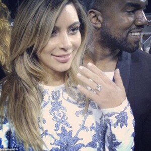 39507198-9279847-October_2013_Kanye_proposed_to_Kim_at_a_baseball_park_in_San_Fra-a-34_1613792946962.jpg