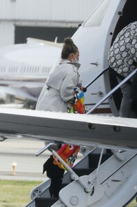 chrissy-teigen-boarding-a-private-jet-in-la-01-19-2021-8.jpg