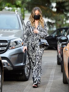 chrissy-teigen-in-a-patterned-blouse-and-pants-los-angeles-11-05-2020-0.jpg