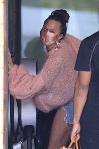 chrissy-teigen-in-tiny-denim-shorts-la-02-11-2021-6.jpg