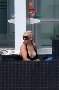 christina-aguilra-in-swimsuit-at-a-pool-in-miami-02-12-2021-6.jpg