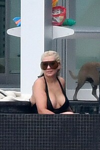 christina-aguilra-in-swimsuit-at-a-pool-in-miami-02-12-2021-7.jpg