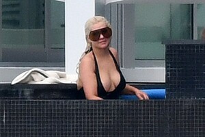christina-aguilra-in-swimsuit-at-a-pool-in-miami-02-12-2021-8.jpg