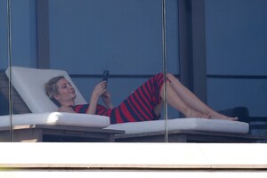 ivanka-trump-in-a-red-and-black-striped-dress-on-her-balcony-in-miami-02-08-2021-1.jpg