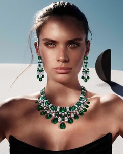 Model wears the Graff Tribal collection emerald and diamond diamond high jewellery earrings and necklace.jpg