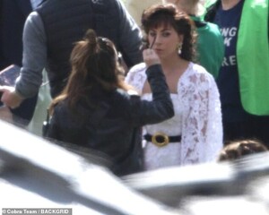 40590014-9372093-Preened_to_perfection_A_make_up_artist_was_seen_adding_to_Gaga_s-m-88_1615994140579.jpg