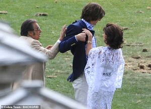 40590038-9372093-Hot_and_bothered_Adam_was_seen_removing_his_jacket_at_one_point_-m-89_1615994147361.jpg