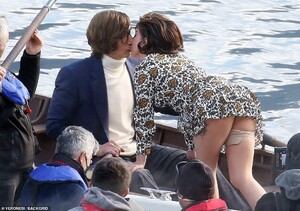 40640798-9376799-Pucker_up_Lady_Gaga_exuded_90s_glamour_as_she_filmed_scenes_at_V-m-13_1616086347619.jpg