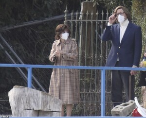 40644052-9376799-Covered_up_In_between_scenes_they_safely_covered_up_in_white_cor-a-59_1616091006879.jpg