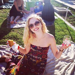 dreama-walker-with-drink.jpg