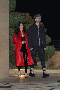 megan-fox-weaning-a-long-red-leather-trench-coat-and-pvc-pants-nobu-in-malibu-03-18-2021-0.jpg