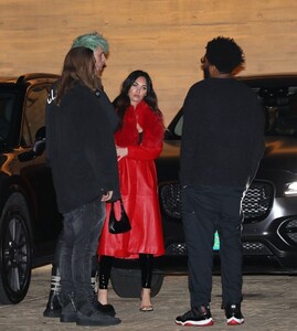 megan-fox-weaning-a-long-red-leather-trench-coat-and-pvc-pants-nobu-in-malibu-03-18-2021-5.jpg