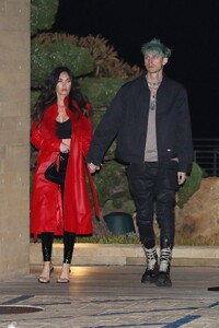 megan-fox-weaning-a-long-red-leather-trench-coat-and-pvc-pants-nobu-in-malibu-03-18-2021-6.jpg