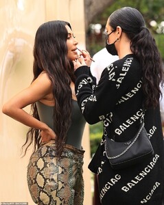41475846-9447887-Touching_up_In_between_shots_the_reality_TV_sensation_could_be_s-a-143_1617846338751.jpg