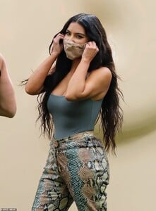 41475886-9447887-Represent_Kim_s_mask_also_happened_to_be_a_SKIMS_product-a-149_1617846339000.jpg