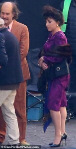 41509738-9450587-Styled_to_perfection_Gaga_s_raven_tressed_were_styled_into_a_vol-m-177_1617904117219.jpg