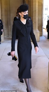 41877718-9481635-Once_outside_the_chapel_the_Duchess_wore_a_long_buttoned_coat_ov-m-132_1618670557088.jpg