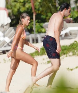 41915848-9484959-Heating_up_A_source_told_Us_Weekly_that_their_relationship_is_ge-a-55_1618779449437.jpg