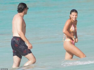 41915862-9484959-Escapades_They_spent_the_day_hopping_between_the_tropical_waters-a-62_1618779449673.jpg