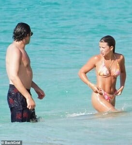41915878-9484959-Famous_ties_Her_new_boyfriend_is_the_son_of_Universal_Music_Grou-a-63_1618779449678.jpg