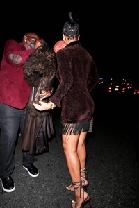 Rihanna---Night-out-in-a-brown-fringe-mini-dress-and-strappy-heels-at-Delilah-in-West-Hollywood-04.jpg
