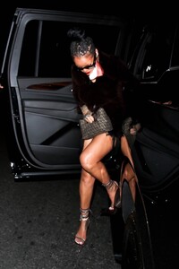 Rihanna---Night-out-in-a-brown-fringe-mini-dress-and-strappy-heels-at-Delilah-in-West-Hollywood-11.jpg