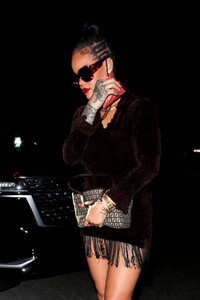 Rihanna---Night-out-in-a-brown-fringe-mini-dress-and-strappy-heels-at-Delilah-in-West-Hollywood-17.jpg