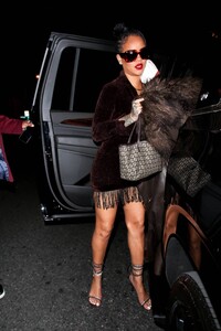 Rihanna---Night-out-in-a-brown-fringe-mini-dress-and-strappy-heels-at-Delilah-in-West-Hollywood-21.jpg
