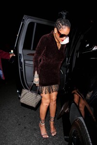 Rihanna---Night-out-in-a-brown-fringe-mini-dress-and-strappy-heels-at-Delilah-in-West-Hollywood-32.jpg