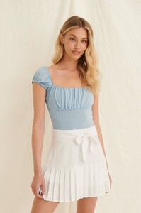 nakd_recycled_tie_detail_frill_mini_skirt_1659-000046-0001_05j.thumb.jpg.a89873bb7d93304bd226f94c39f366b8.jpg