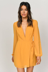 ochre-tell-em-wrap-dress.thumb.jpg.5e4ebf372d7010d21d8e8fc29c38ee78.jpg