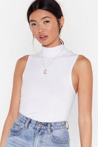 white-sleeveless-fitted-turtleneck-top (3).jpeg