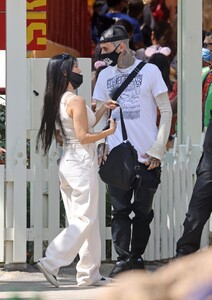 kourtney-kardashian-and-travis-barker-at-disneyland-in-anaheim-05-19-2021-2.jpg