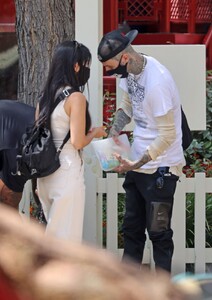 kourtney-kardashian-and-travis-barker-at-disneyland-in-anaheim-05-19-2021-4.jpg