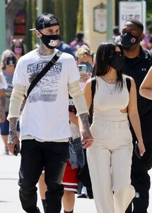 kourtney-kardashian-and-travis-barker-at-disneyland-in-anaheim-05-19-2021-7.jpg