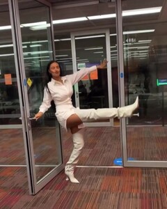 maya-jama-in-mini-dress-and-knee-high-boots-london-05-20-2021-6.jpg