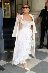 lady-gaga-in-a-white-lace-and-ruffle-dress-with-a-mint-purse-nyc-07-01-2021-0.jpg