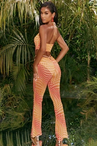 4310_11_match-it-up-orange-abstract-print-halter-neck-crop-top-cut-out-sheer-flares.webp