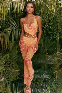 4310_1_match-it-up-orange-abstract-print-halter-neck-crop-top-cut-out-sheer-flares.webp