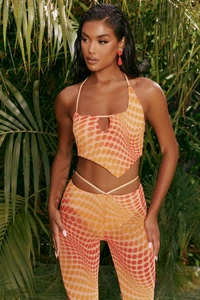 4310_5_match-it-up-orange-abstract-print-halter-neck-crop-top-cut-out-sheer-flares.webp