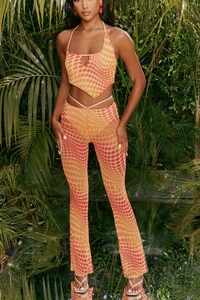 4310_6_match-it-up-orange-abstract-print-halter-neck-crop-top-cut-out-sheer-flares.webp