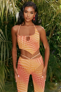 4310_7_match-it-up-orange-abstract-print-halter-neck-crop-top-cut-out-sheer-flares.webp