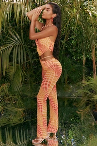 4310_9_match-it-up-orange-abstract-print-halter-neck-crop-top-cut-out-sheer-flares.webp